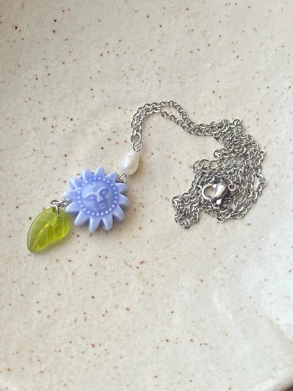 Handmade unique funky cute light blue ceramic sun & Czech glass leaf & freshwater pearl necklace☀️🌿 - Image 5