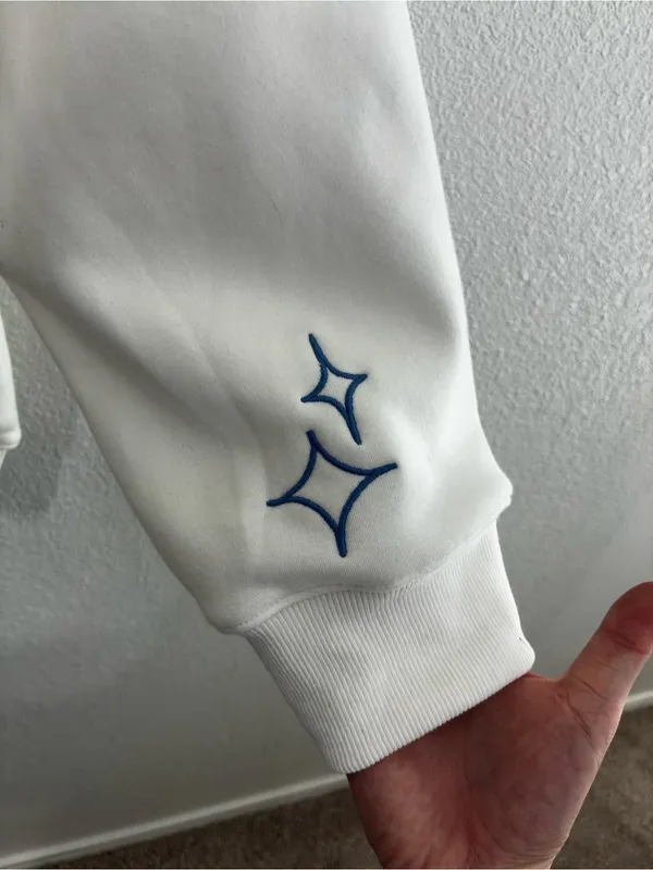 Altar'd State White Crewneck Sweater with Blue Star Motifs - Image 2