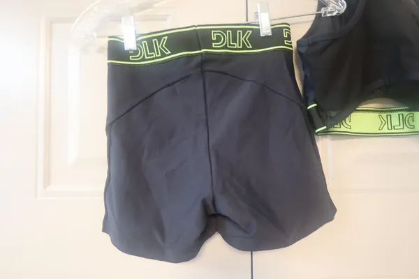 DLK Workout exercise loungewear casual summer active shorts and one should top sports bra set in black and lime green - Image 11