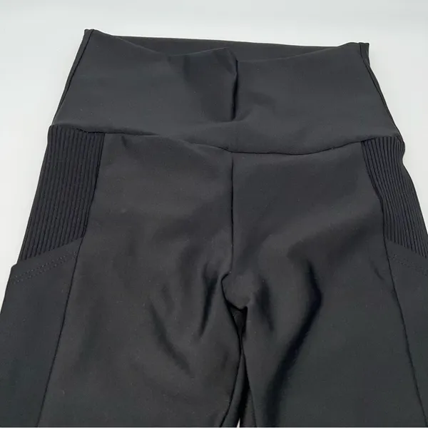 Peloton Women’s Black Leggings with white Branding on Side Pocket-Size S - Image 2