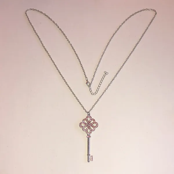 Silver Tone Key Pendant Necklace with Pink Accents - Image 3