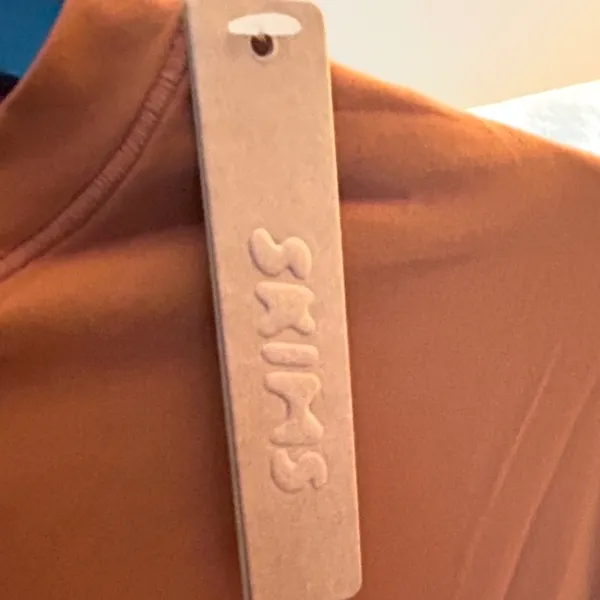 SKIMS Bodysuit long Sleeve Crew Neck , Size 4X. Color is Carmel. NWT. - Image 4