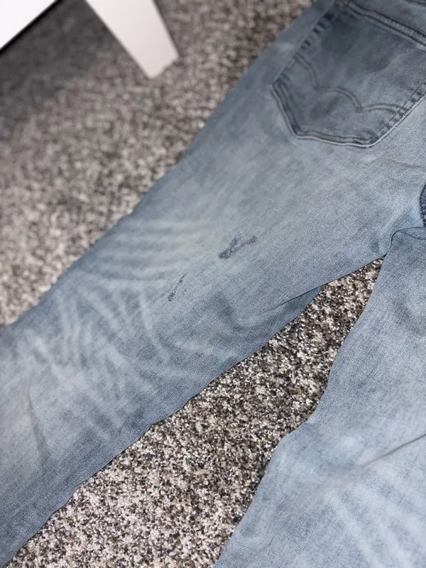 American Eagle Outfitters Slim Straight Light Blue Jeans with Paint Details - Image 11