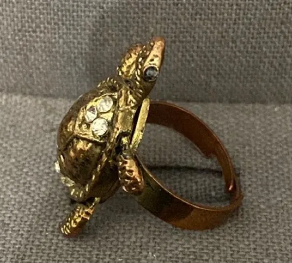 Vintage Bronze Turtle with Rhinestones Expansion Ring - size 7. can have bigger fingers to fit. Beautiful & fun conversation piece. Feet & tail move. Gently warn & Excellent condition. None smoking home. priced to sell at as is condition. Don’t like my price, make reasonable offer! And thank you for checking my closet. - Image 6