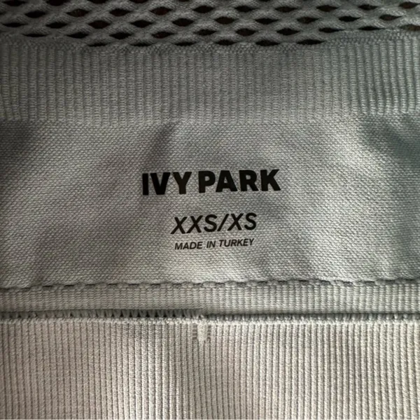 IVY PARK Light Blue Mesh Detail Athletic Athleisure Crop Top - Image 7