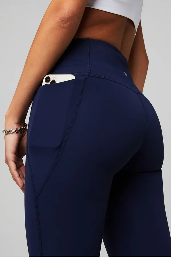 Fabletics Oasis PureLuxe High-Waisted Crossover Flare Leggings Navy - Image 4