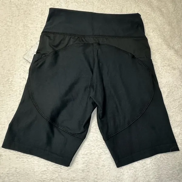UFC Women's Black Bike Shorts with Red Logo and Side Pockets - Image 7