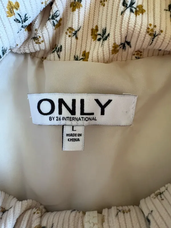Women’s Puffer Vest in Cream with Green Floral Print - Image 2