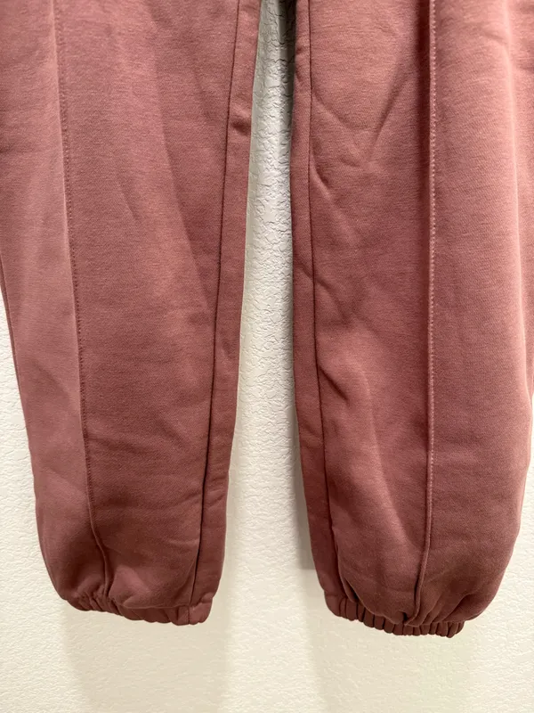 Pink Nike sweatpants with black logo - Image 3