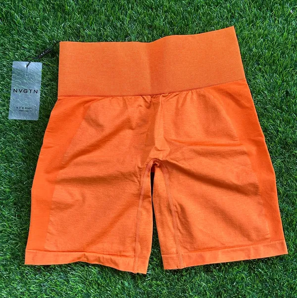 NVGTN Sunset Orange Contour Seamless Shorts - Image 2