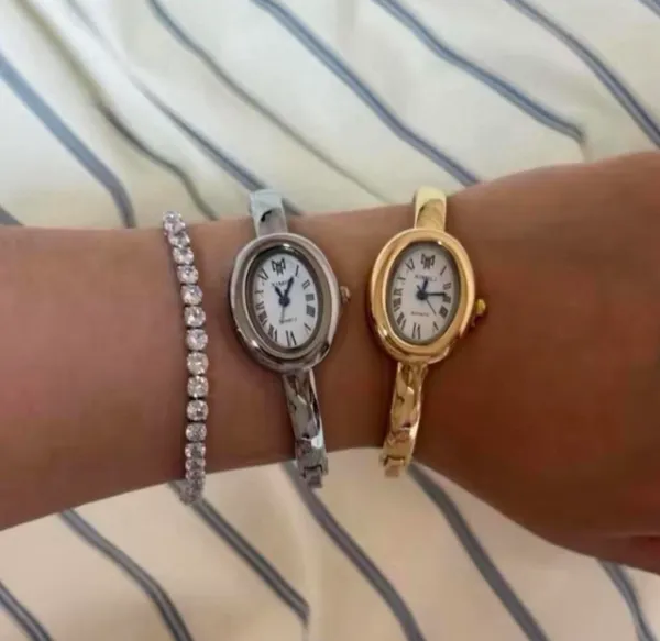 Brand New y2k style gold bangle watch with white face and Roman numerals - Image 4