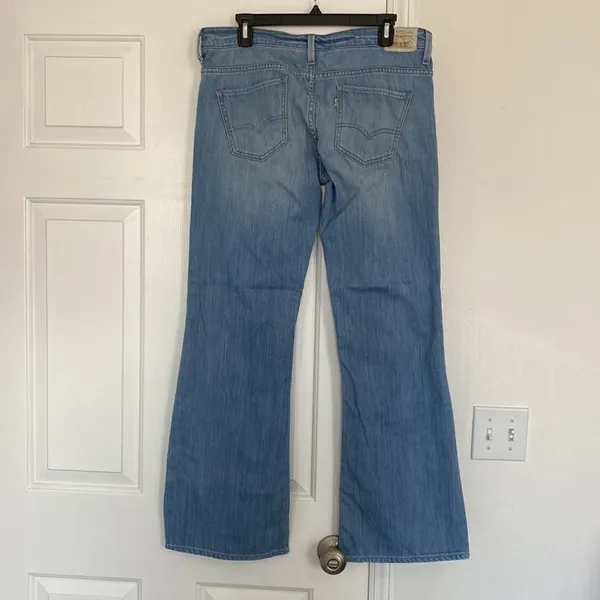 Levi's light wash low flare denim. - Image 6
