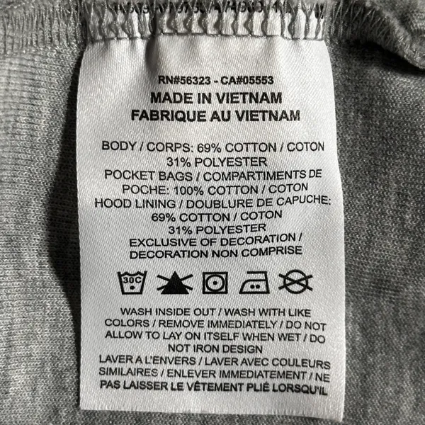 Nike Gray Minimalist Hoodie XS Y2K Athleisure Streetwear Description: Soft gray Nike hoodie with embroidered logo and kangaroo pocket. Perfect minimalist, gorpcore, streetwear, gym, and casual layering essential. Pre-owned Condition: Excellent Flaws: No significant flaws observed. Stored: Model created by AI. NikeHoodie Streetwear Athleisure MinimalistStyle Gorpcore HeatherGray Pullover LogoHoodie Layering Y2K - Image 5