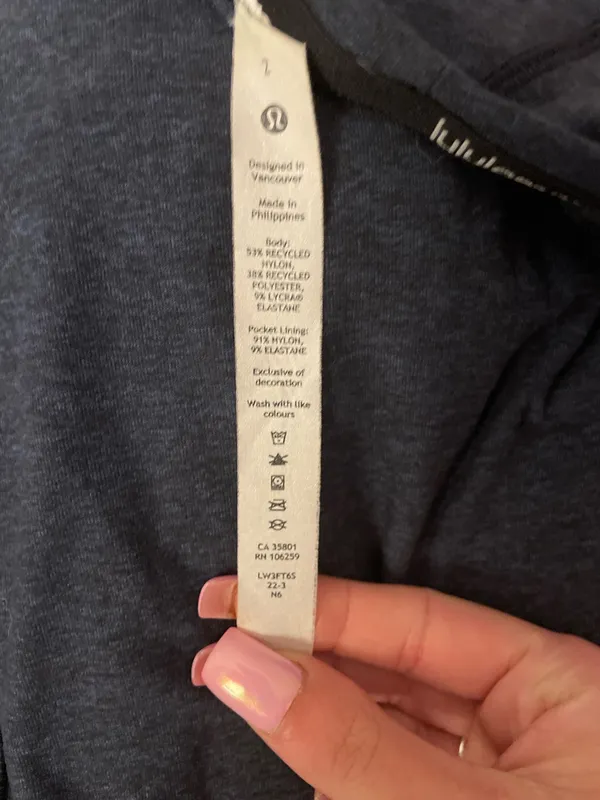Lululemon long-sleeve training/workout top with a zip pocket - Image 4