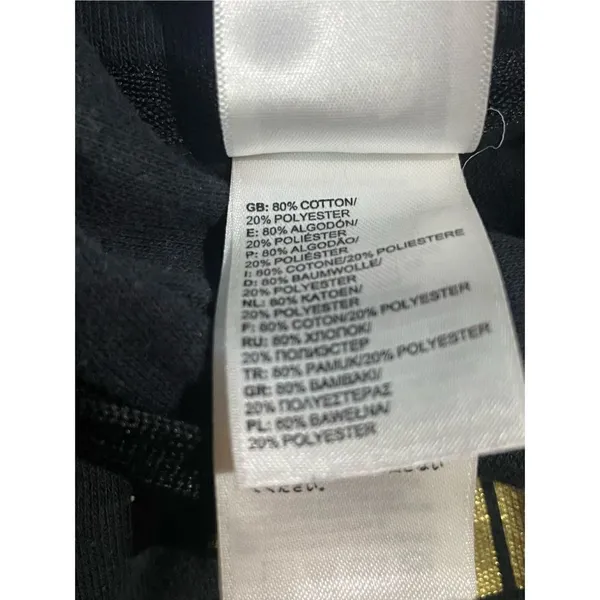 The North‎ Face black hoodie with gold graphic size medium - Image 6