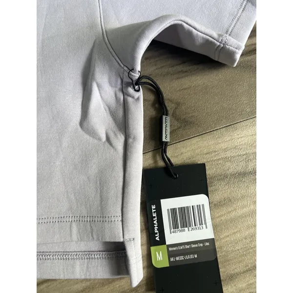 Alphalete Woman’s ELMTS Short SLEEVE Crop - Lilac ,Size Medium - Image 9