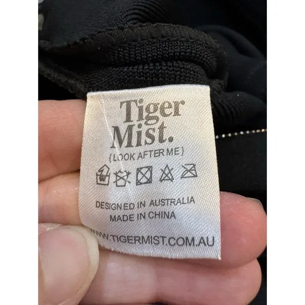 Tiger Mist black jumpsuit featuring a deep plunging neckline Size Small Cutouts - Image 10