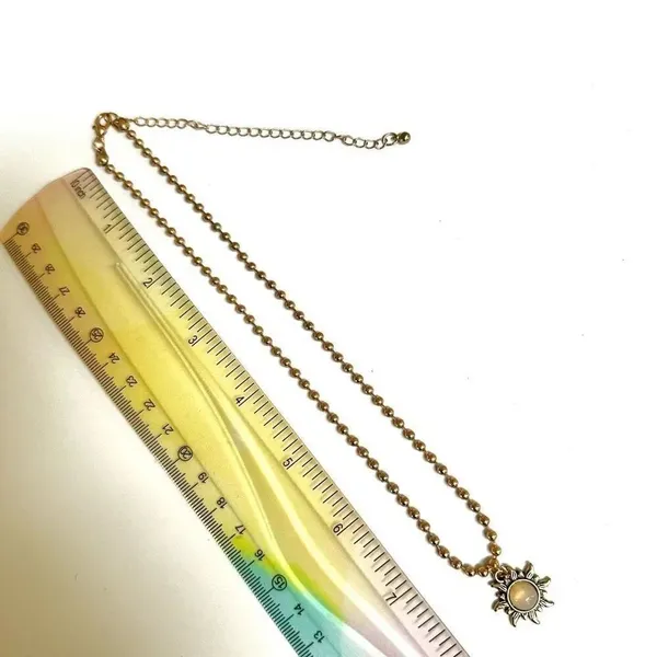 Gold tone sun pendant necklace - Image 5