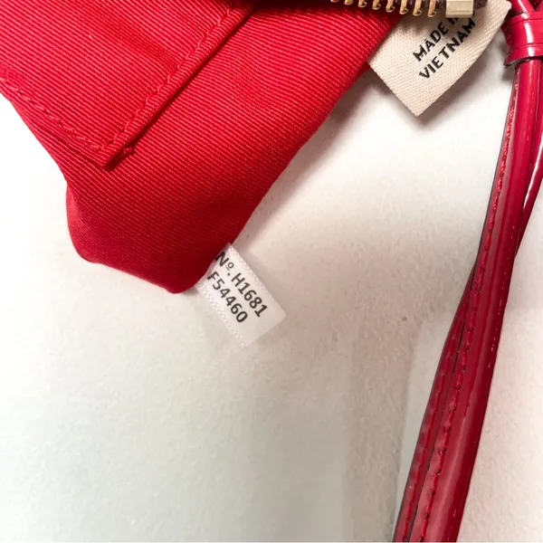 Coach wristlet with patent leather trim - Image 7