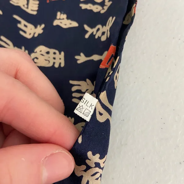 EUC Navy blue gold lettering pattern 100%‎ silk scarf neck tie wrap - Image 3