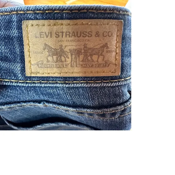 Levi's Distressed‎ Straight Leg Jeans with Artistic Ripped Detail Medium Wash - Image 6