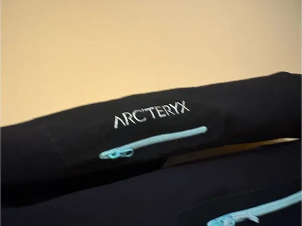 Arc’Teryx Hyllus Hooded Softshell Jacket in Black & Light Blue - Image 5