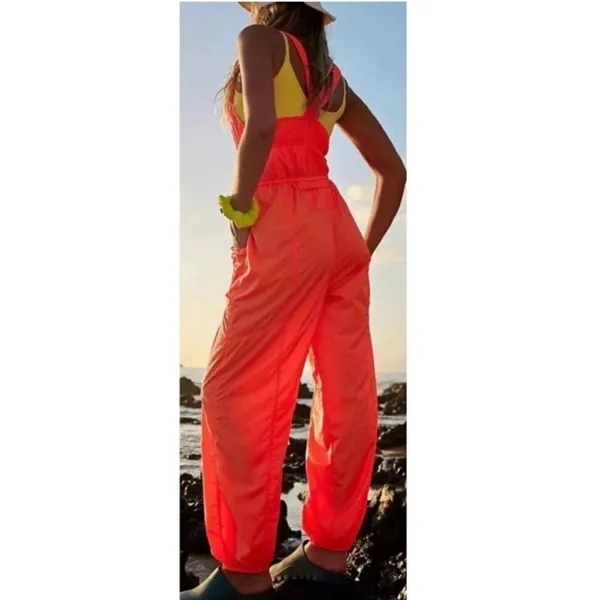 Free People Movement tropic sport one piece orange jumpsuit. Size medium - Image 4
