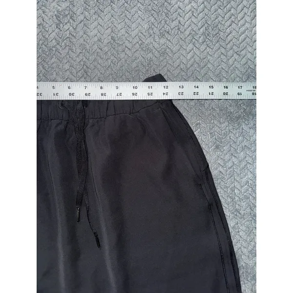 Lululemon Womens On The Fly Skirt Black Travel‎ Commute Curved Hem Sz 6 - Image 6