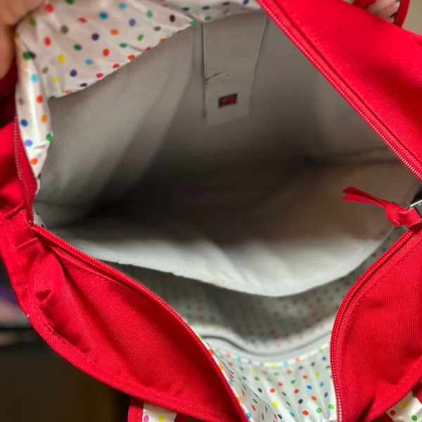 OGIO RED BAG WITH POLKA DOTS 14” X 14”. Preloved - Image 7