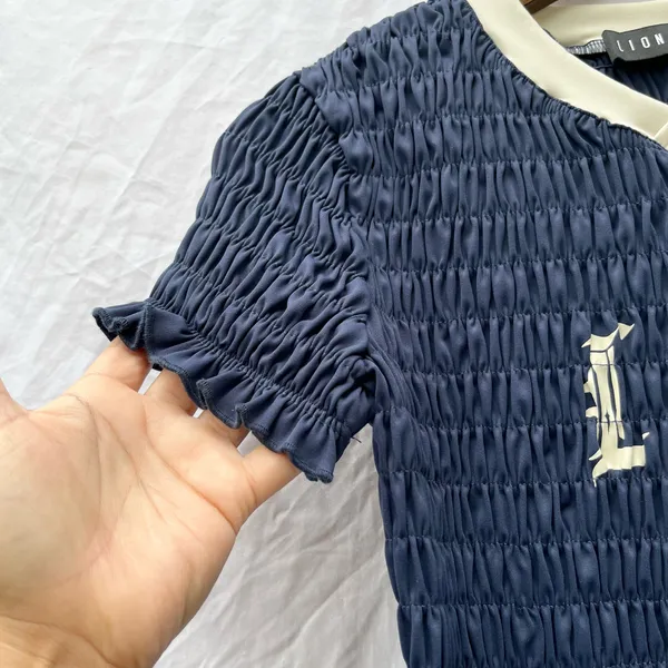 REVOLVE x LIONESS SCRUNCHED SMOCKED SPECTATE DALLAS COWBOYS JERSEY SMALL TOP - Image 8