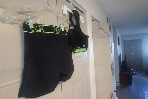 DLK Workout exercise loungewear casual summer active shorts and one should top sports bra set in black and lime green - Image 9