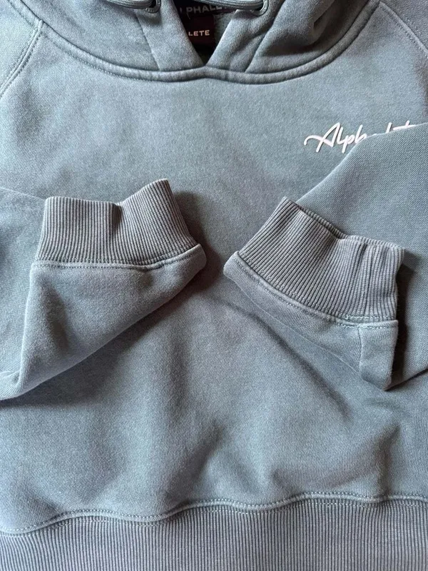 Alphalete Women's Cropped Long Sleeve Hoodie in Teal - Image 9