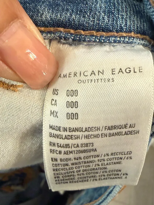 American Eagle Outfitters Distressed Light Blue High-Rise Denim Shorts - Image 6