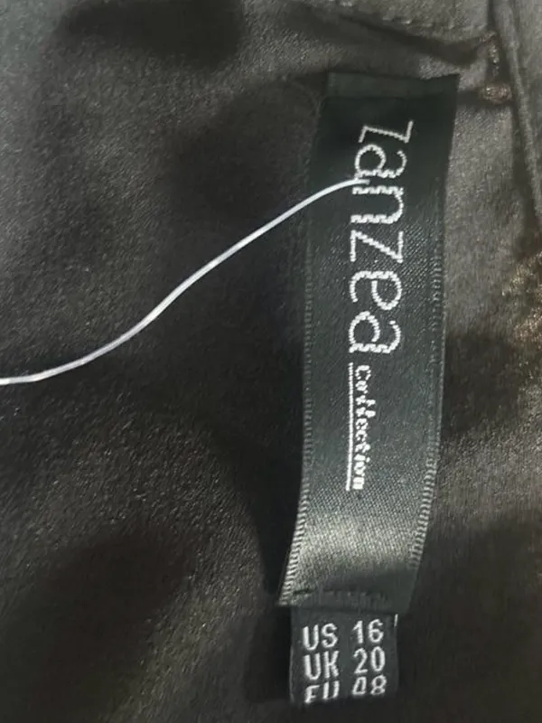 Zanzea Collection black blouse with ruffled sleeves and a flowy silhouette - Image 2