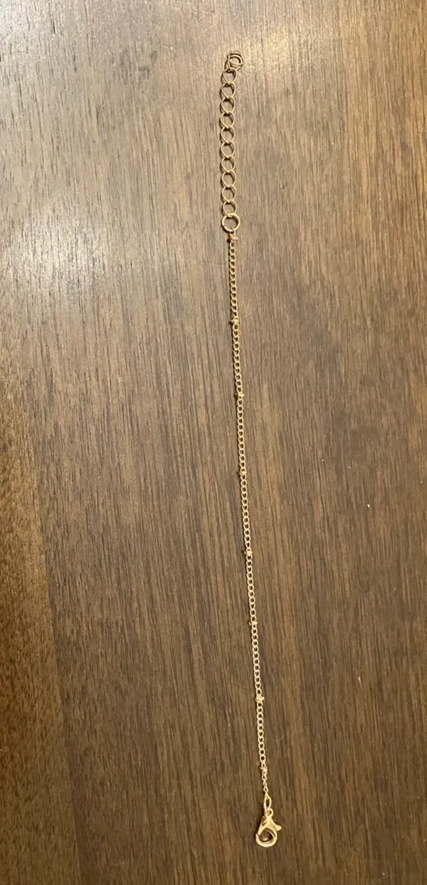 Delicate Satellite Gold Chain Bracelet with Knot Accents - Image 3