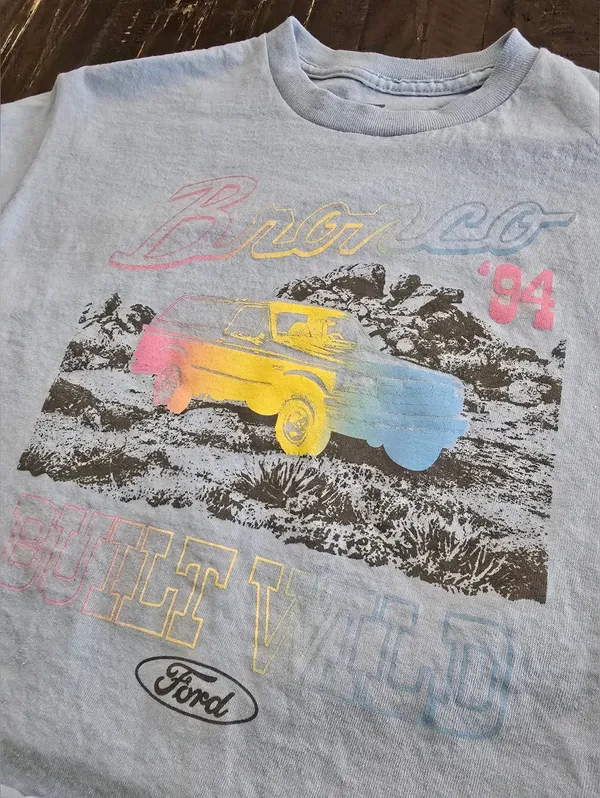 Vintage `94 Ford Bronco Built Wild Graphic T-Shirt Women's Cropped Medium Blue - Image 3