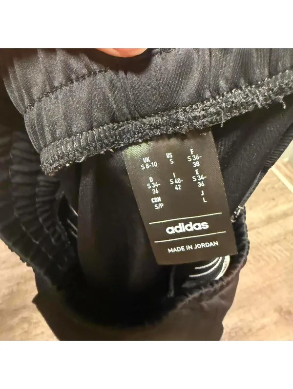 Adidas black track pants with white stripes sportswear - Image 3