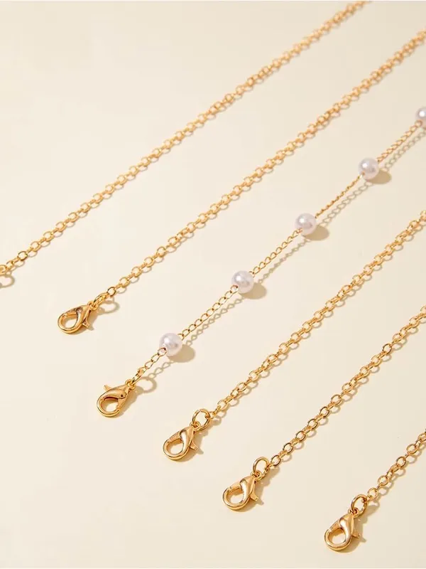 14K Gold Plated Multi-Layered Necklace with Star, Key, and Butterfly Charms - Image 8