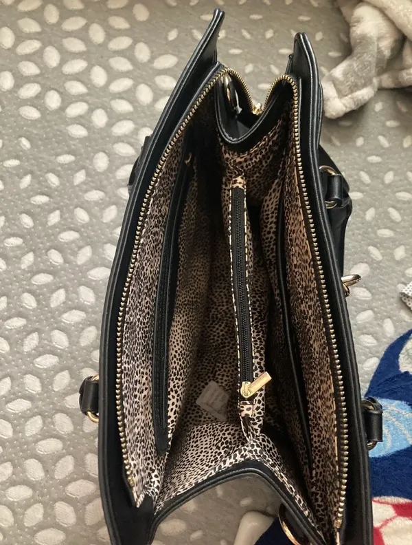 Black handbag/crossbody with red and white stipe Cheetah print interior design Plenty of zippers - Image 4