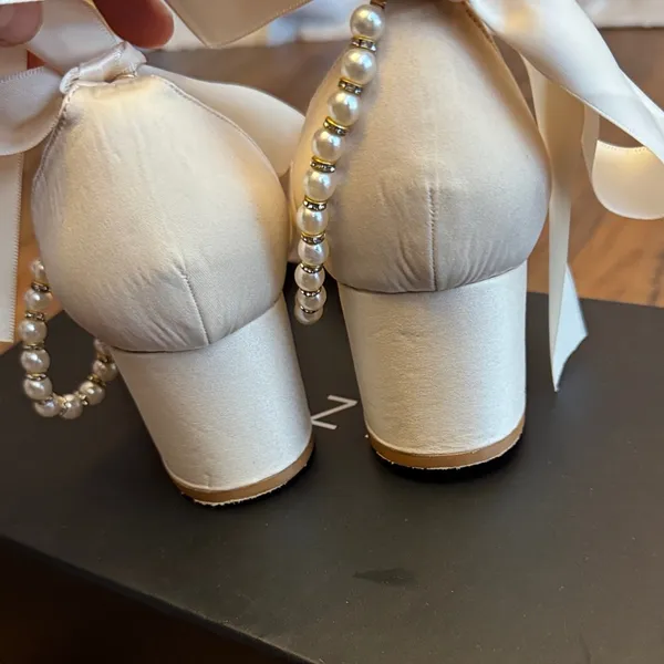 Azazie Cream Heels with Bow and Pearl Accent - Image 5