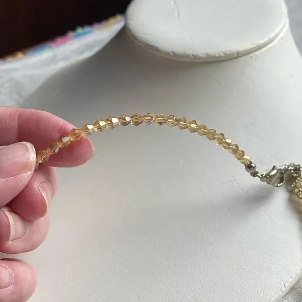 Peach glass AB coated bi-cone round facetted necklace. - Image 5