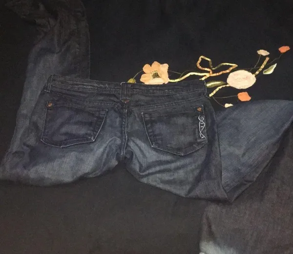 Dark colored flare jeans - Image 3
