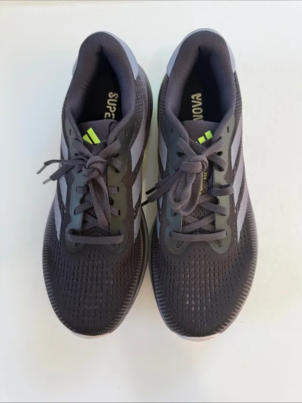 adidas women’s Black Athletic Shoes with White Stripes and Neon Green Accent - Image 2