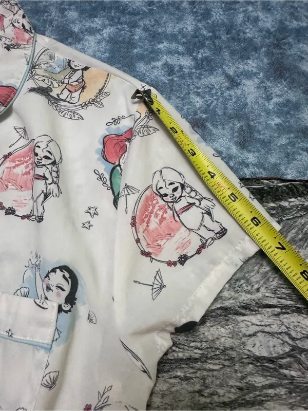 Disney Cream Short Sleeve Top with Multicolor Princess & Mermaid Sketches M - Image 6