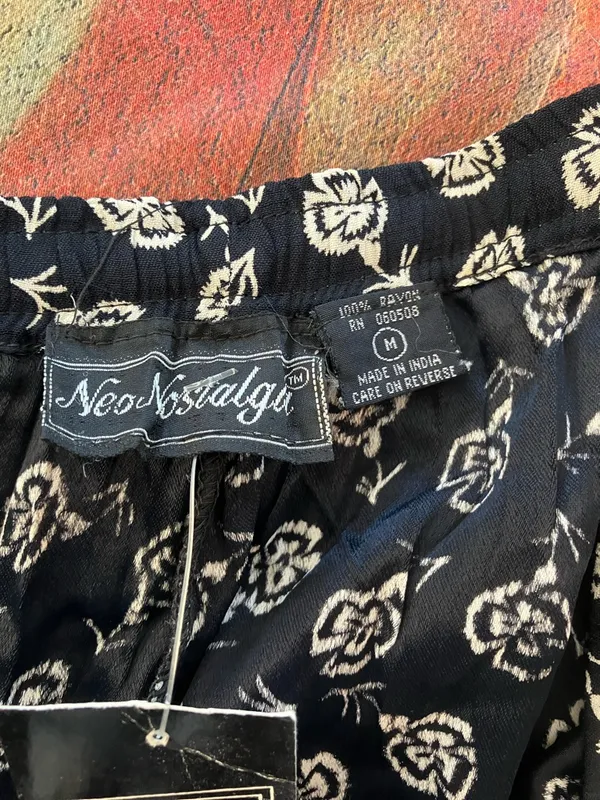 Nostalgia Black and White Floral Flare Pants tied waistband pockets - Image 7