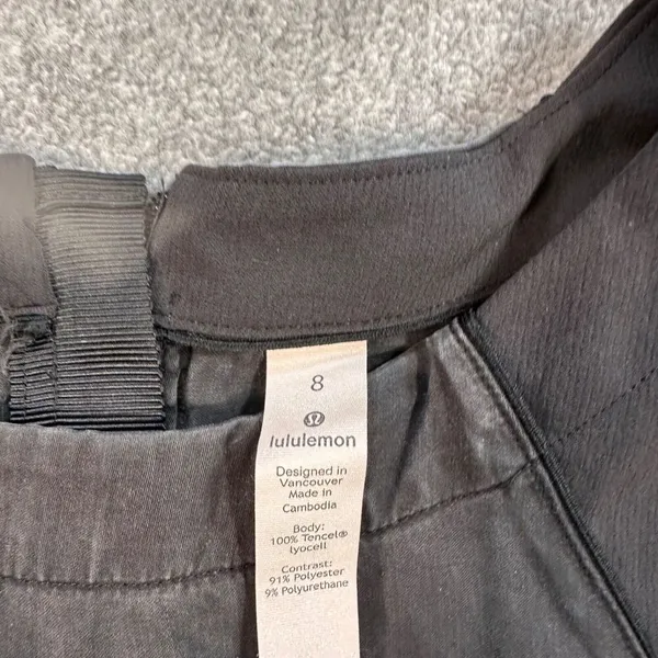 Lululemon Short Sleeve Top Women's 8 Black Zip Back Drawstring Waist Active Gym - Image 4