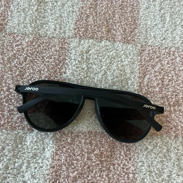 Quay Australia Sleek Black Sunglasses with Teal Lenses - Image 2