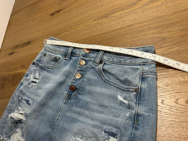 Size 4 American Eagle jean skirt with rips - Image 7