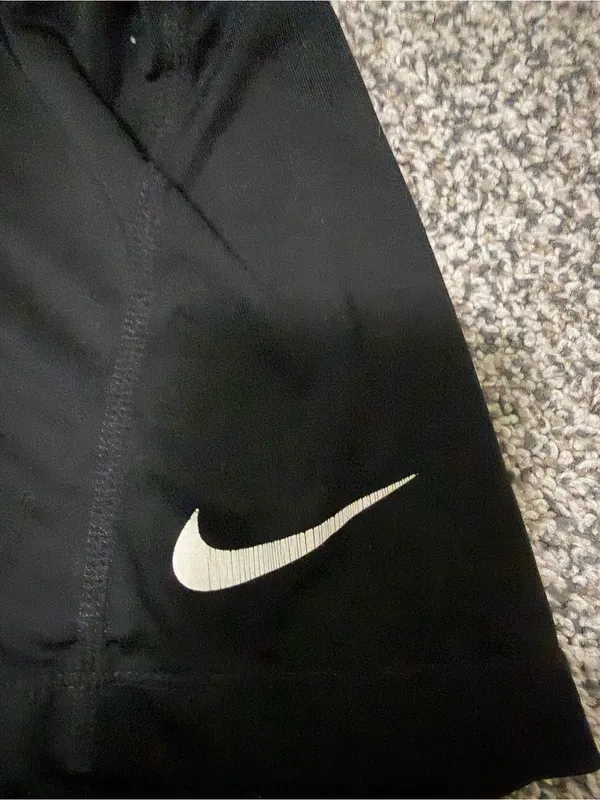 Nike Black Compression Shorts with Light Green Waistband - Image 2