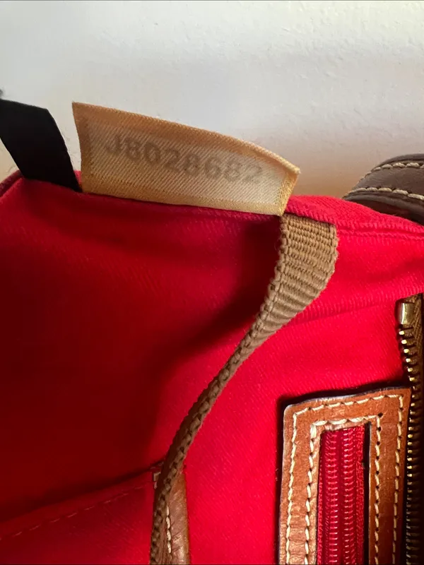 Dooney & Bourke Orange Pebble Leather Tote with Contrasted Straps & added tie - Image 6